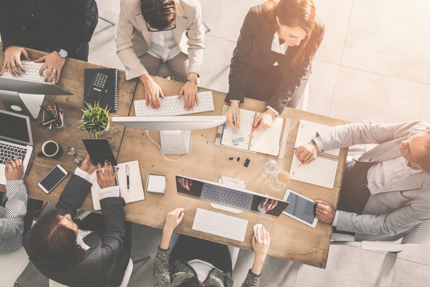 Overhead view of people in a meeting